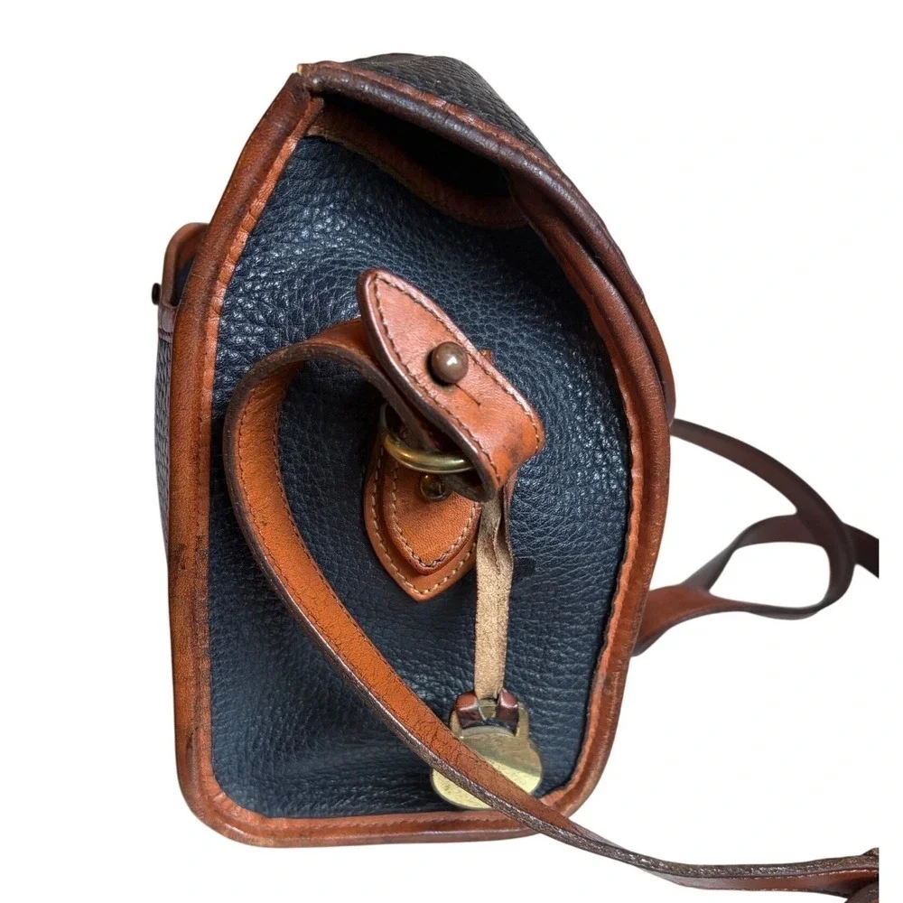 Dooney & Bourke All Weather Leather Vintage Navy‎  Crossbody Bag Brass Duck Fob